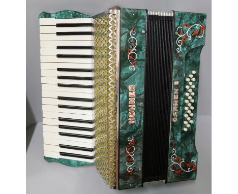 A Hohner piano accordian 