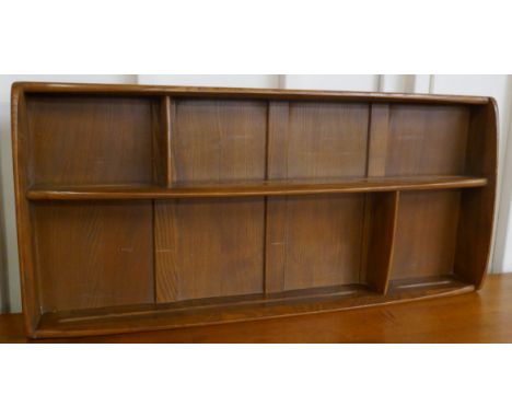 An Ercol Golden Dawn elm wall hanging plate rack 