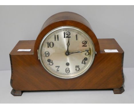 An early 20th Century walnut mantel clock