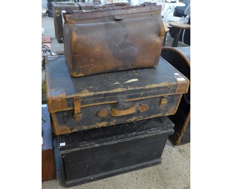 Two vintage steamer trunks and a suitcase 