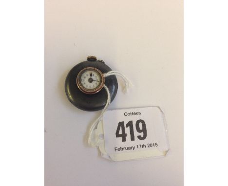 An early 20th century button hole watch.