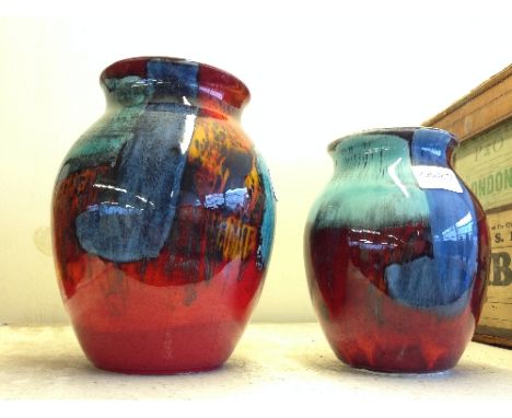 A Poole Pottery Gemstones Living Glaze vase together with another.