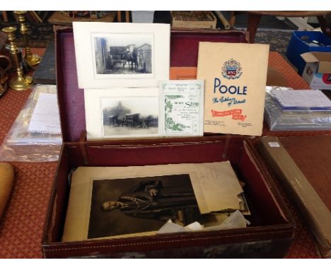 A leather suitcase containing an interesting collection of Poole related ephemera including items relating to W J Stickland (