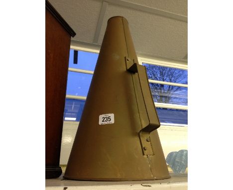 An early 20th century brass megaphone.