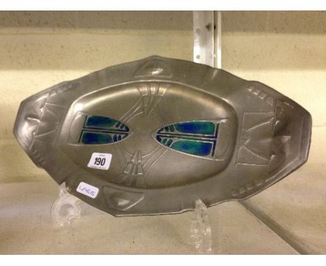 An Arts & Crafts style pewter and enamel twin handled dish.