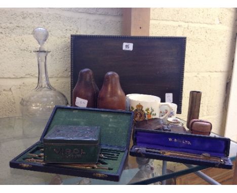 Two leather cased glass flasks together with a folding camera, geometry instruments and other items.