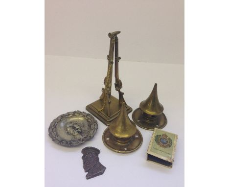 A pair of brass Pickelhaube helmet spikes together with a small quantity of various Trench Art items.
(R23)