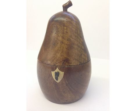 A fruitwood tea caddy modelled as a Pear.