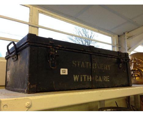 An early 20th century small metal trunk, inscribed 'Stationery With Care'.