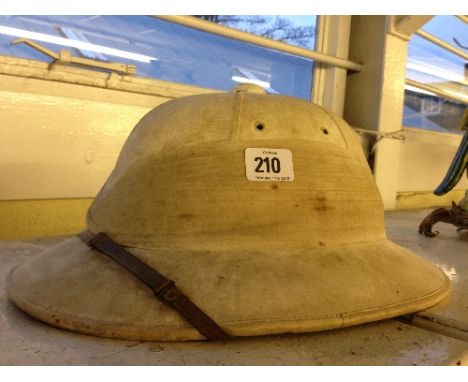 An early 20th century pith helmet: The Aura Patent (original internal supplier's label), (examine).