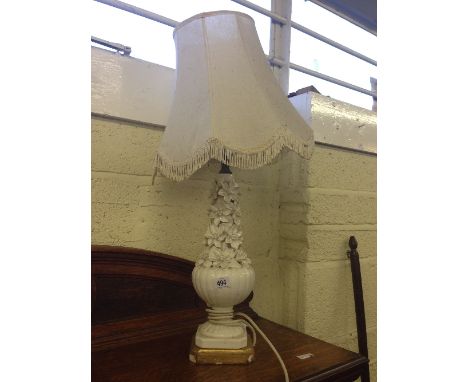 A white glazed floral china lamp base.