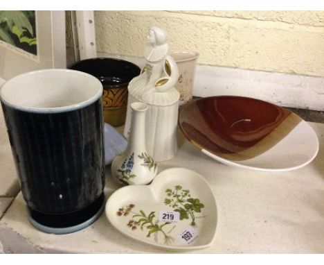 A collection of eight various Poole Pottery items.