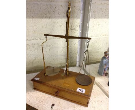 A set of apothecary balance scales.