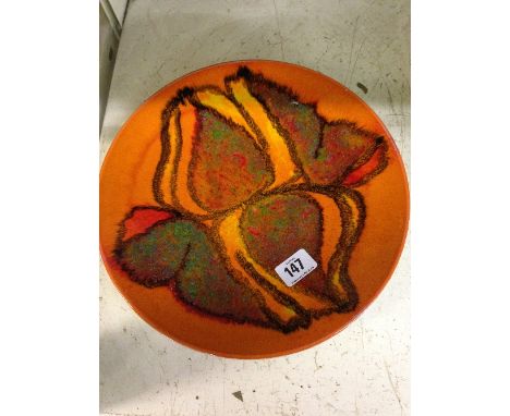 A Poole Pottery Delphis bowl, shape 4, decorated in an abstract pattern on orange ground by Cynthia Bennett.