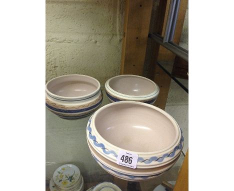 A Poole Pottery contemporary Freeform fruit bowl, shape 769, decorated in a wavy line pattern together with a small ROC patte