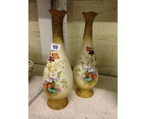 A pair of Austrian early 20th century Turn Vienna vases with pierced rims in the Royal Worcester Blush Ivory style decorated 