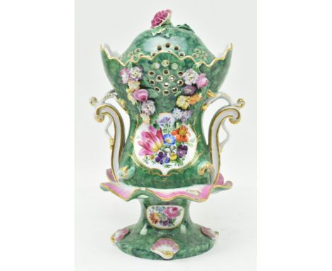An early 19th century Regency porcelain lidded frill vase &amp; cover. The vase of green ground with domed lid &amp;  applied