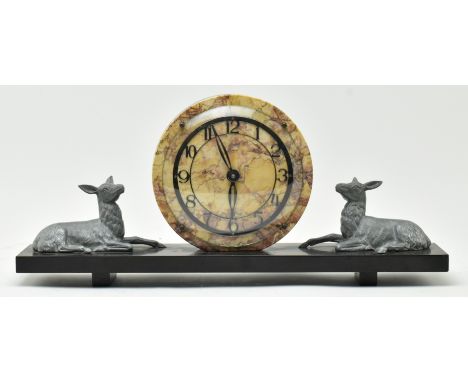 A 1930s Art Deco French marble &amp; slate mantel clock with deers. The clock having a circular marble clock face with brass 