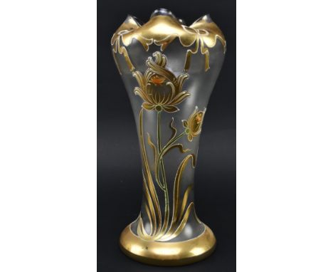 A Bohemian Art Nouveau late 19th century gilt &amp; enamel clear glass vase in the manner of LeGras &amp; Cie. The vase havin