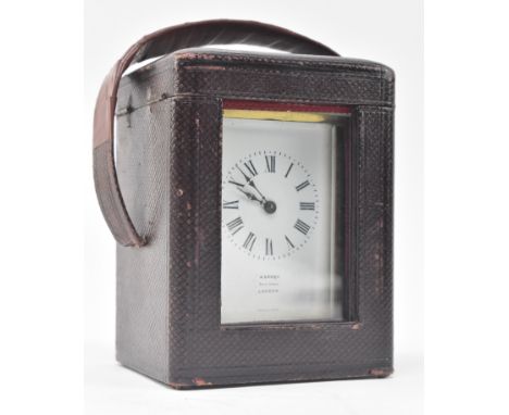 Asprey of London - An early 20th century glass &amp; brass French made carriage clock in original leather case with key. The 