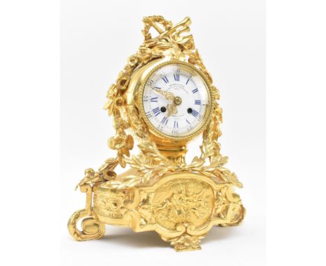 Le Roy &amp; FiIls, Paris - A French 19th century circa 1880s Louis XV style gilt metal 8-day mantel clock. The clock having 