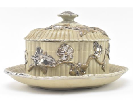 Villeroy &amp; Boch, Mettlach. A continental German 19th century silvered painted stoneware lidded butter dish. The dish of s