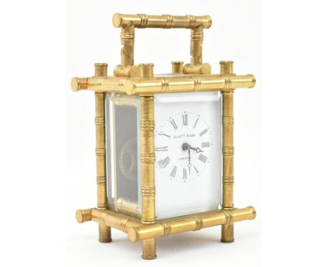 Elliott &amp; Son, London - A Victorian Aesthetic Movement 19th century brass carriage clock. The brass handles &amp; edges f