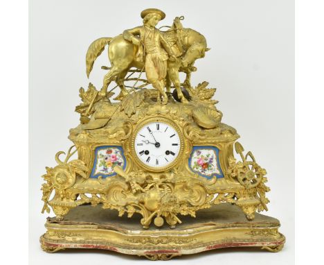 Miroy Freres, Paris - A French 19th century gilt metal &amp; enamel figurative eight-day movement mantel clock. The clock hav