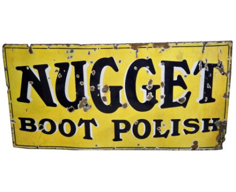 An advertising Nugget Polish, vitreous enamel sign, 63 x 122 cm.