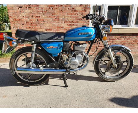 1975 Suzuki GT185 M, 184 cc. Registration number JOX 15P. Frame number 40273. Engine number 40411. In 1973, Suzuki introduced