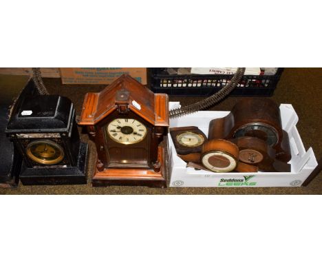 A Victorian black slate striking mantle clock, an alarm mantel clock, a striking mantle clock and three other mantle timepiec