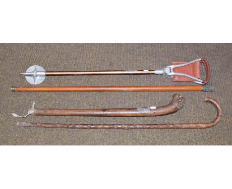 A Mallaca walking cane with white metal/Indian mount, a shooting stick, a club, and a walking cane (4)