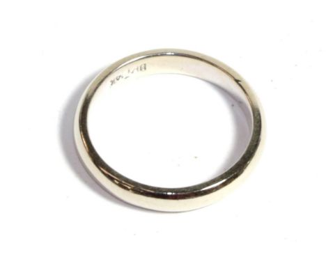 A white band ring, stamped '14K', finger size K.  Gross weight 2.94 grams. 