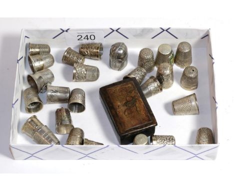 A collection of twenty six silver and silver plated thimbles, together with an early 19th century papier mache ebonised snuff