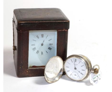 A brass carriage timepiece with original fitted travelling case, and a full hunter pocket watch, signed N.Y Standard Watch Co