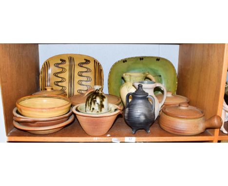 Shelf of Studio pottery, including Sidney Tustin Winchcombe bowl (cracked) Muchelney domestic wares and Coldstone slipware et
