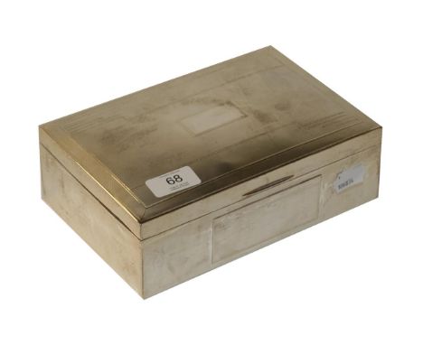 A silver cigarette box, oblong the cover engine turned