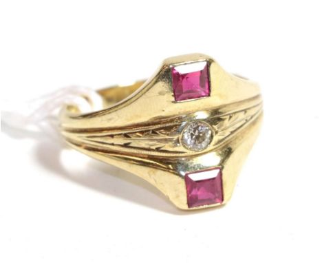 A synthetic princess cut ruby and diamond three stone ring, stamped '14K', finger size U1/2.  Gross weight 8.5 grams. 