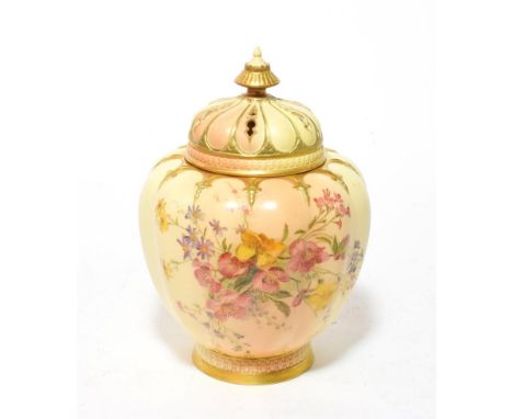 A Royal Worcester Blush Ivory pot pourri vase complete with covers, decorated with flowers