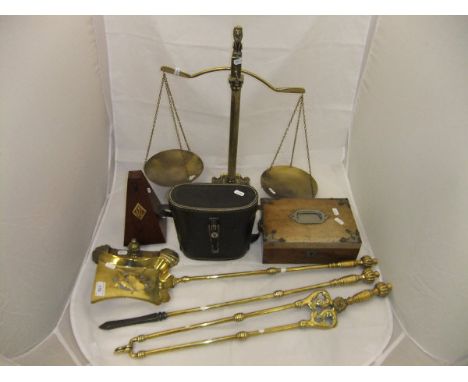 A set of three 19th Century brass fire tools, a set of brass balance scales with lion finial, a small oak stationery box, a m
