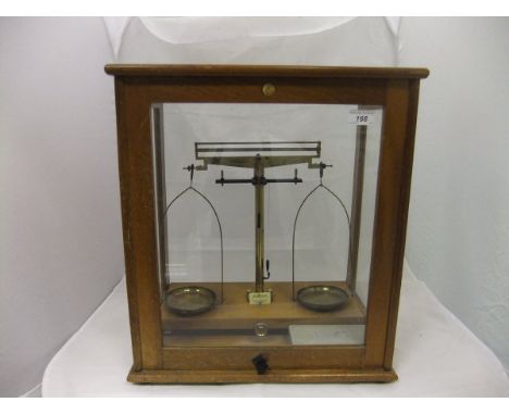 A beech cased set of Philip Harris Limited Birmingham balance scales