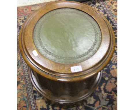 A Victorian circular mahogany commode stool with tooled green leather top 