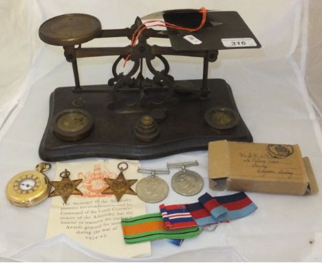 An early 20th Century set of brass postal scales on beech base, together with an Elgin gold plated cased half hunter pocket w