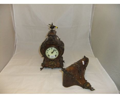 A Continental walnut cased ormolu mounted mantel clock, the back of the movement stamped "Lenzkirch A. G. U. 899343", with ma