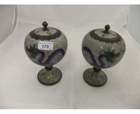 A pair of Chinese cloisonné spherical shaped jars and covers, raised on pedestal to circular foot, the bodies decorated with 