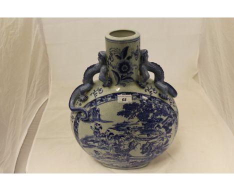 A large 20th Century Chinese blue and white crackleware decorated moon flask with dragon handles, bears seal mark to base