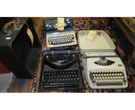 A Remington noiseless typewriter, an Adler Tippa typewriter and an Imperial 202 portable typewriter