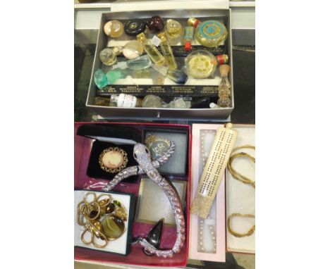 A box of various costume jewellery, Victorian carved ivory cribbage board and markers, and a box of various eau de toilette b