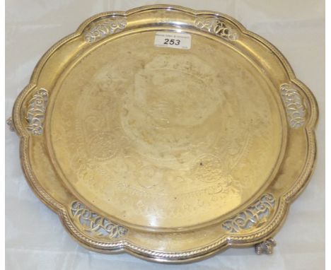 A Victorian silver salver with pierced decoration to rim and engraved decoration to centre, bearing initial and inscribed 189