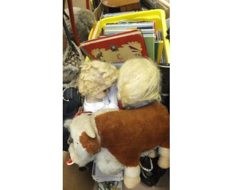 Two vintage dolls, a Merrythought bull plush toy, collection of old postcards, clarinet and a box of children's books